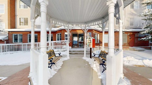 107-8 Prestwick Pond Terrace Se, Calgary, AB - Outdoor With Facade