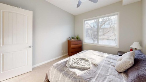 107-8 Prestwick Pond Terrace Se, Calgary, AB - Indoor Photo Showing Bedroom