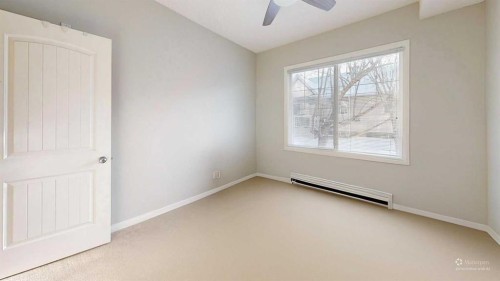 107-8 Prestwick Pond Terrace Se, Calgary, AB - Indoor Photo Showing Other Room