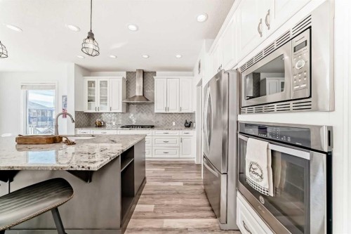18 Mount Rae Place, Okotoks, AB - Indoor Photo Showing Kitchen With Upgraded Kitchen