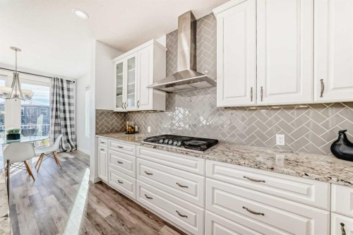 18 Mount Rae Place, Okotoks, AB - Indoor Photo Showing Kitchen With Upgraded Kitchen