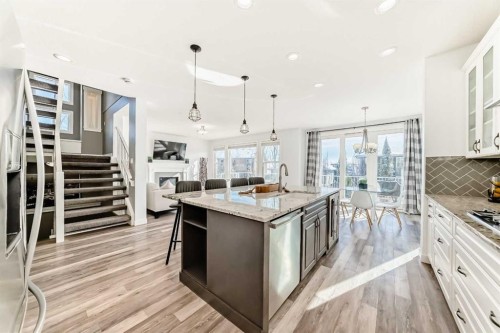 18 Mount Rae Place, Okotoks, AB - Indoor Photo Showing Kitchen With Upgraded Kitchen