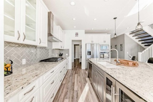 18 Mount Rae Place, Okotoks, AB - Indoor Photo Showing Kitchen With Upgraded Kitchen