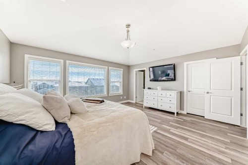 18 Mount Rae Place, Okotoks, AB - Indoor Photo Showing Bedroom