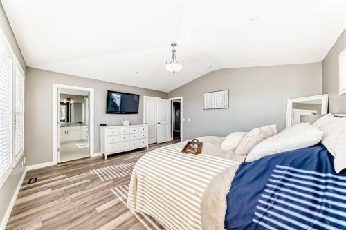 18 Mount Rae Place, Okotoks, AB - Indoor Photo Showing Bedroom