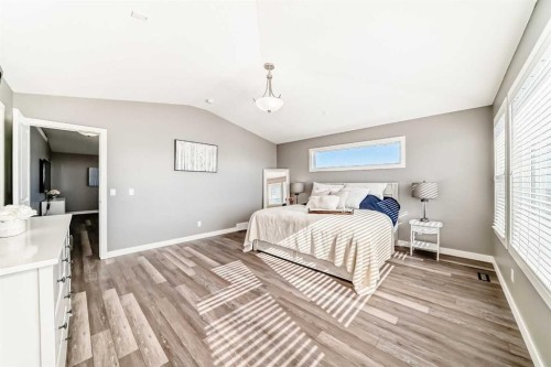 18 Mount Rae Place, Okotoks, AB - Indoor Photo Showing Bedroom
