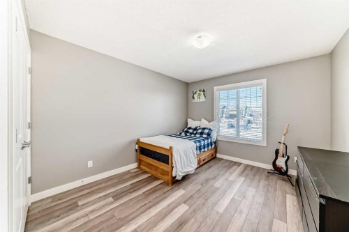18 Mount Rae Place, Okotoks, AB - Indoor Photo Showing Bedroom