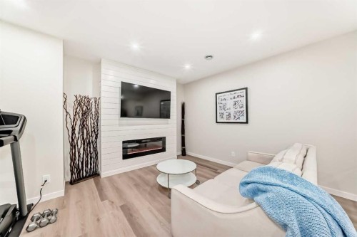 18 Mount Rae Place, Okotoks, AB - Indoor With Fireplace