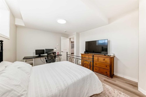 18 Mount Rae Place, Okotoks, AB - Indoor Photo Showing Bedroom
