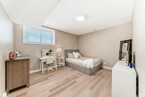 18 Mount Rae Place, Okotoks, AB - Indoor Photo Showing Bedroom