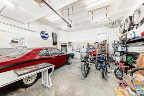 18 Mount Rae Place, Okotoks, AB - Indoor Photo Showing Garage