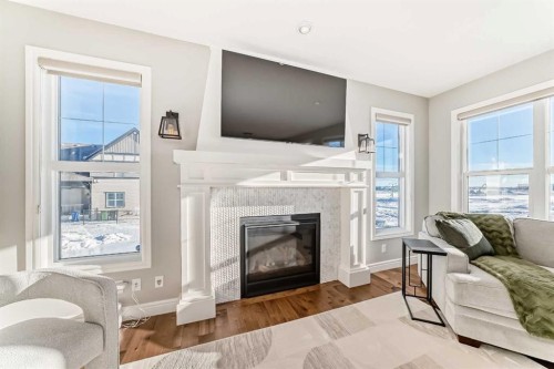 35 Mahogany Crescent Se, Calgary, AB - Indoor Photo Showing Living Room With Fireplace