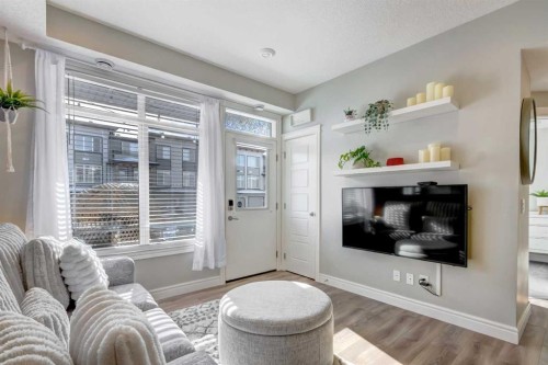15-230 Seton Passage, Calgary, AB - Indoor Photo Showing Living Room