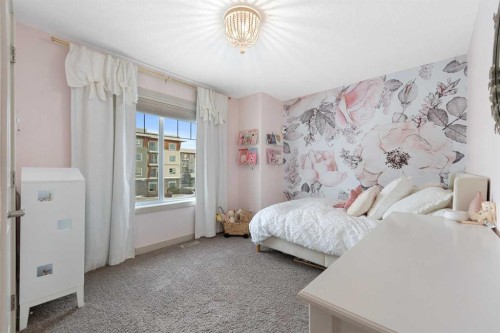 35 Aspenshire Drive Sw, Calgary, AB - Indoor Photo Showing Bedroom