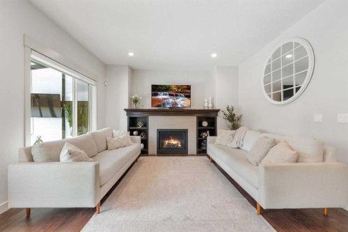 35 Aspenshire Drive Sw, Calgary, AB - Indoor Photo Showing Living Room With Fireplace