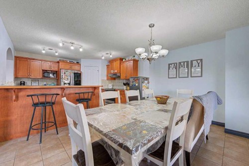 284 Hawkmere View, Chestermere, AB - Indoor Photo Showing Dining Room
