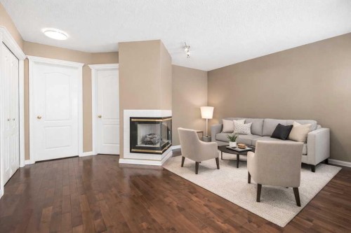 138 Sierra Morena Green Sw, Calgary, AB - Indoor Photo Showing Other Room With Fireplace