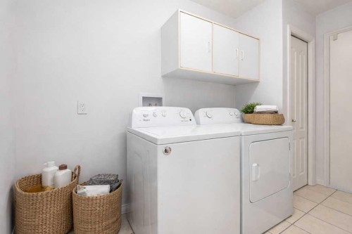 138 Sierra Morena Green Sw, Calgary, AB - Indoor Photo Showing Laundry Room