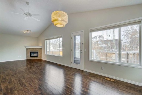 18336 Chaparral Street Se, Calgary, AB - Indoor Photo Showing Living Room With Fireplace