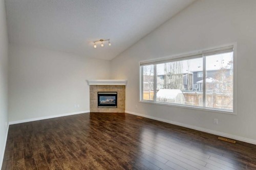 18336 Chaparral Street Se, Calgary, AB - Indoor Photo Showing Living Room With Fireplace
