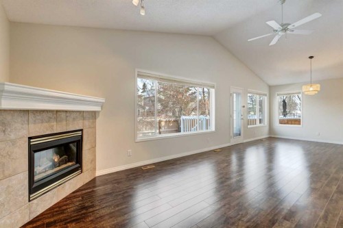 18336 Chaparral Street Se, Calgary, AB - Indoor Photo Showing Living Room With Fireplace
