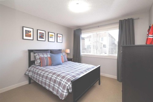 344 Evergreen Circle Sw, Calgary, AB - Indoor Photo Showing Bedroom