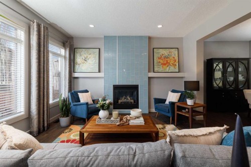 344 Evergreen Circle Sw, Calgary, AB - Indoor Photo Showing Living Room With Fireplace