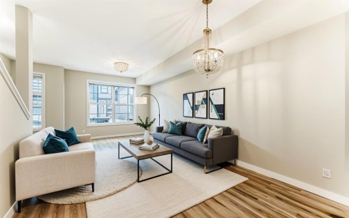 58-138 Seton Passage Se, Calgary, AB - Indoor Photo Showing Living Room