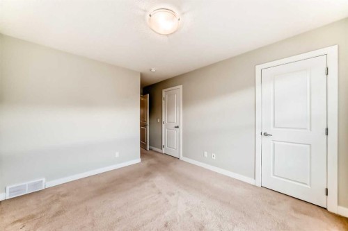 58-138 Seton Passage Se, Calgary, AB - Indoor Photo Showing Other Room