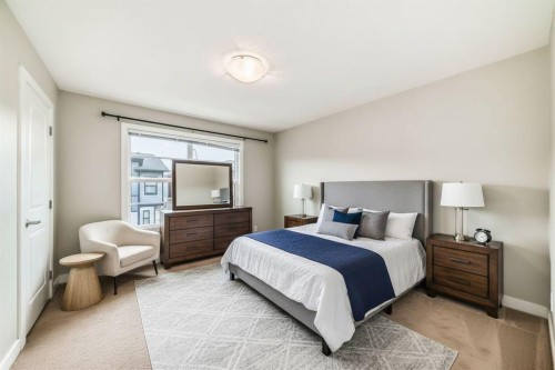 58-138 Seton Passage Se, Calgary, AB - Indoor Photo Showing Bedroom