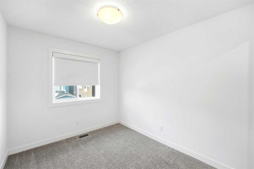 29 Herron Mews Ne, Calgary, AB - Indoor Photo Showing Other Room