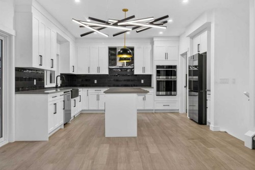 267 Chelsea Heath, Chestermere, AB - Indoor Photo Showing Kitchen With Upgraded Kitchen