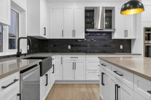 267 Chelsea Heath, Chestermere, AB - Indoor Photo Showing Kitchen With Upgraded Kitchen