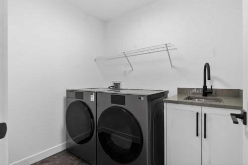 267 Chelsea Heath, Chestermere, AB - Indoor Photo Showing Laundry Room