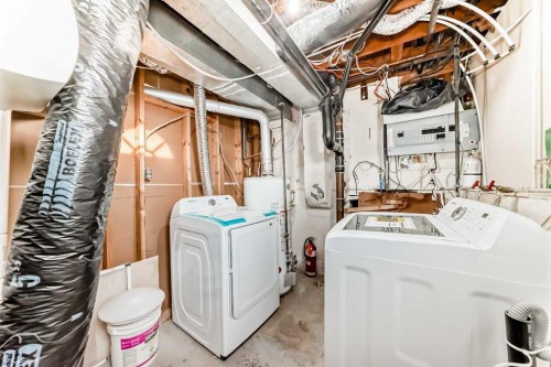 5640 Travis Street Ne, Calgary, AB - Indoor Photo Showing Laundry Room