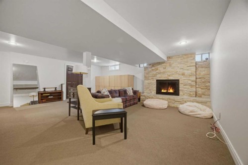 1136 Kildonan Place Sw, Calgary, AB - Indoor With Fireplace