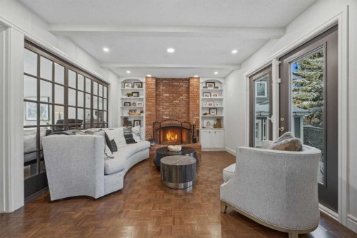 1136 Kildonan Place Sw, Calgary, AB - Indoor Photo Showing Living Room With Fireplace