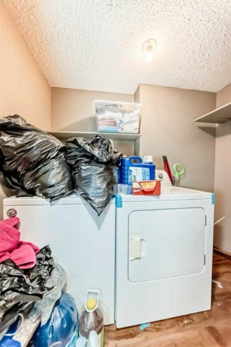 179 Hawkwood Boulevard Nw, Calgary, AB - Indoor Photo Showing Laundry Room