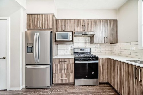 203-225 Redstone Walk Ne, Calgary, AB - Indoor Photo Showing Kitchen