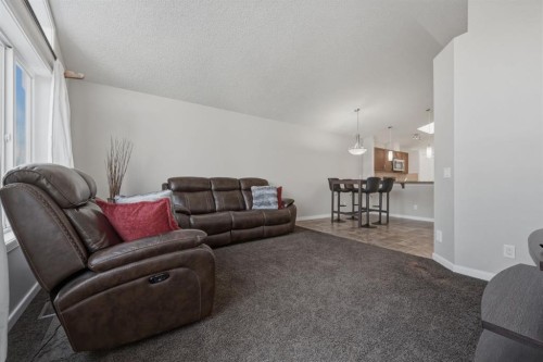 68 Auburn Bay Crescent Se, Calgary, AB - Indoor Photo Showing Living Room