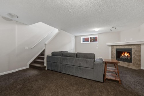 68 Auburn Bay Crescent Se, Calgary, AB - Indoor With Fireplace