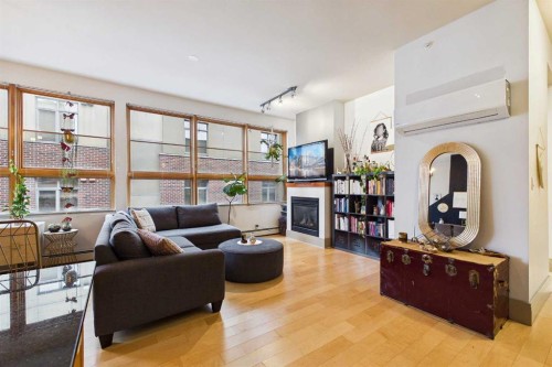 109-177 9 Street Ne, Calgary, AB - Indoor Photo Showing Other Room With Fireplace