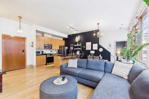 109-177 9 Street Ne, Calgary, AB - Indoor Photo Showing Living Room