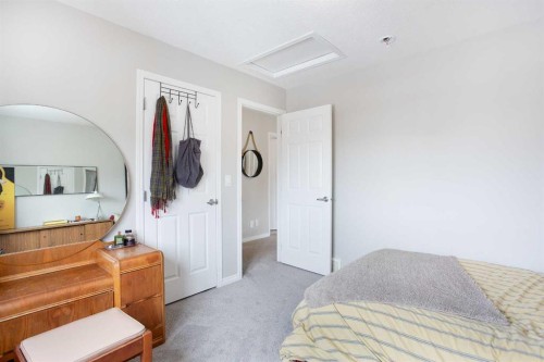 2 Osborne Common Sw, Airdrie, AB - Indoor Photo Showing Bedroom
