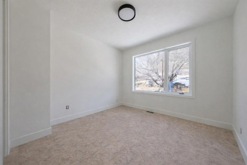 710 Bridge Crescent Ne, Calgary, AB - Indoor Photo Showing Other Room