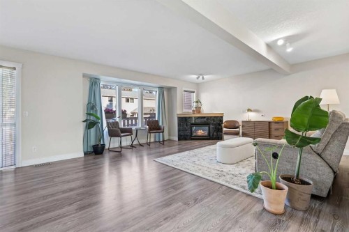 392 Killarney Glen Court Sw, Calgary, AB - Indoor Photo Showing Living Room With Fireplace