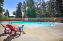 602-8948 Elbow Drive Sw, Calgary, AB  - Outdoor With In Ground Pool With Backyard 