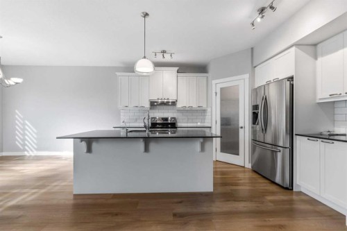 625 Midtown Place, Airdrie, AB - Indoor Photo Showing Kitchen With Stainless Steel Kitchen With Upgraded Kitchen