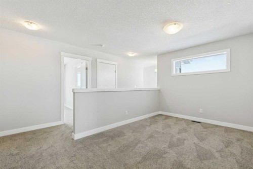 12 Willow Park Point, Cochrane, AB - Indoor Photo Showing Other Room