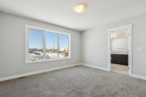 12 Willow Park Point, Cochrane, AB - Indoor Photo Showing Other Room